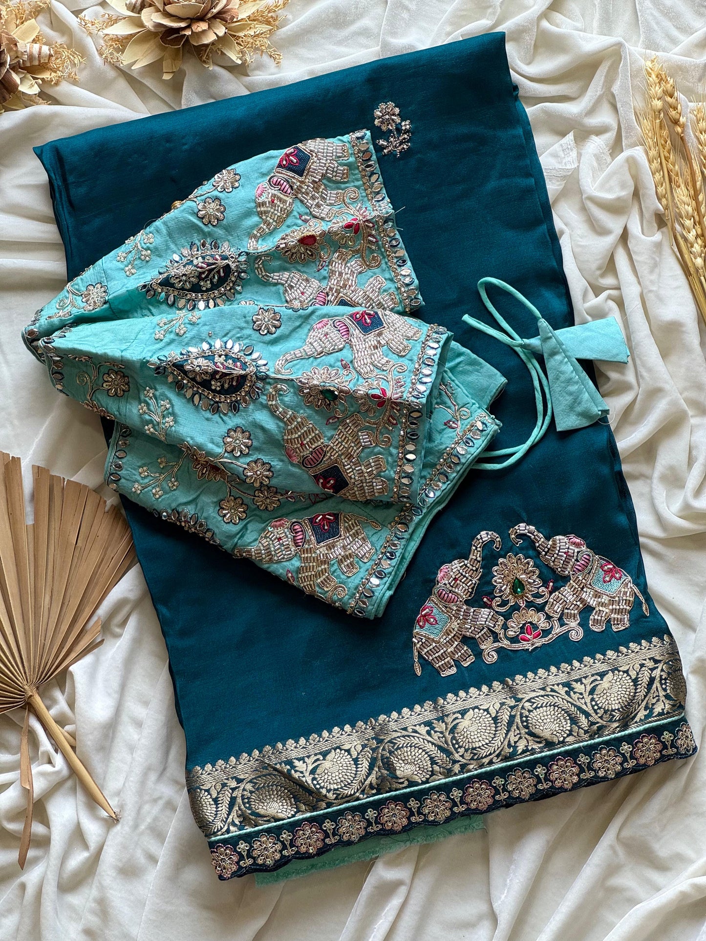 Dola silk saree with beads handwork of elephant